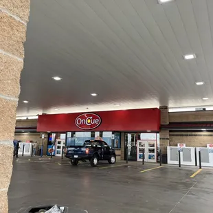  a car parked in a gas station