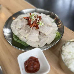 Bossam - slow cooker pork belly with radish kimchi. Tasty