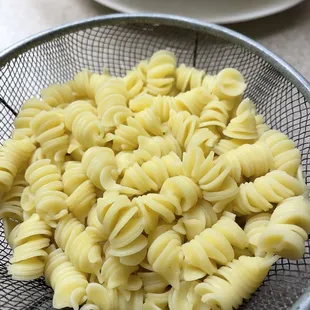 a bowl of cooked pasta