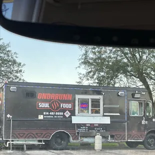 a food truck parked in a parking lot
