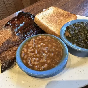 1/2 Rack Pork Baby Back Ribs with baked beans and greens