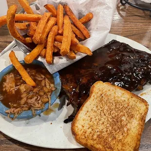 Half 1/2 Rack Pork Baby Back Ribs with sweet potato fries and baked beans