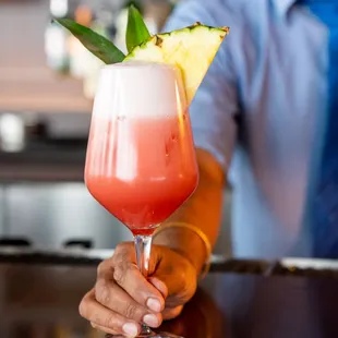 Enjoy a signature cocktail 101 stories above the city