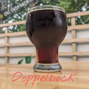 a glass of beer on a table