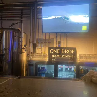 a large screen in the background