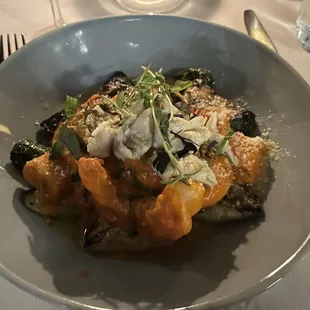 Shrimp and crab over gnocchi, sauce was swimming in oil :(