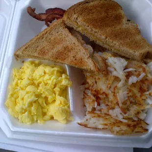 a breakfast in a styrofoam container