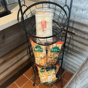 a basket of chips and a bag of cheese