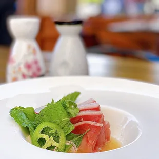 Hamachi w/ pineapple, avocado, Thai herbs | $22