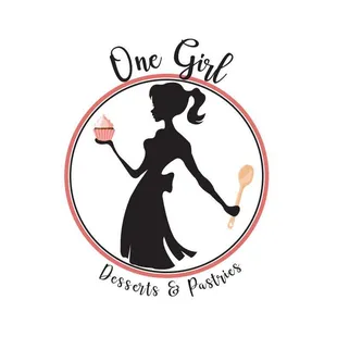 a woman holding a cupcake