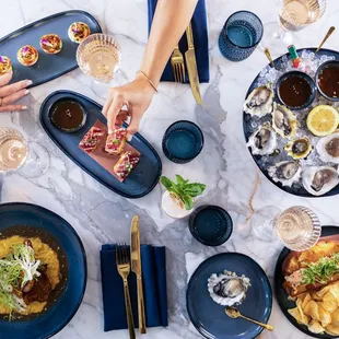 a table full of food and drinks