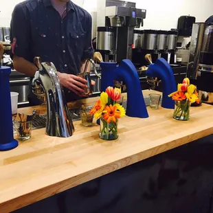 a man pouring coffee