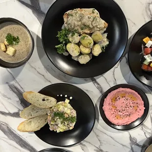 Mushroom Cream Soup, Creamy Chicken on Mushroom sauce with potatoes, greek salad, Olivier Salad, red beet hummus.