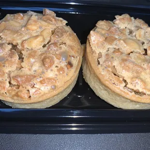 Macadamia nut pie! 2 pack $4. Also in a 4 pack $8! Lots of nuts!  It's like a pecan type of pie in a tart.