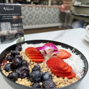 Delicious and filling Açaí Bowl minus bananas at my request.