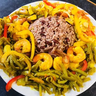 Curry Shrimp rice and peas and steamed cabbage