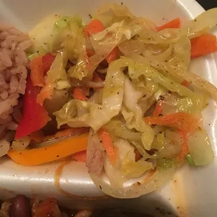 Cabbage. Primarily onions, carrots, and orange bell peppers.