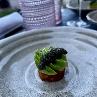 Latke with caviar and avocado