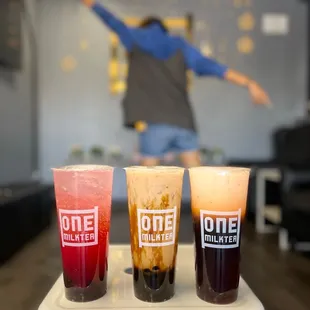 (Left) Strawberry Fizz with boba, Brown Sugar Black Milk Tea with double boba, Thai Milk Tea.