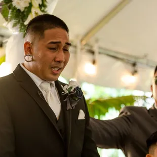 handsome groom crying LOL perfect photo