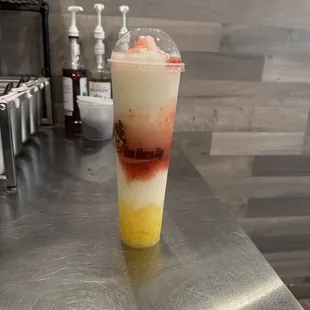 a smoothie in a plastic cup