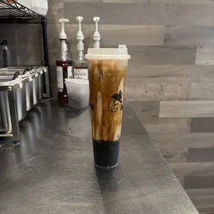 a cup of coffee on a counter