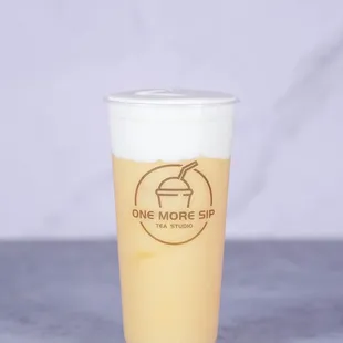 a cup of cheese mango smoothie