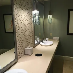 two sinks and a mirror