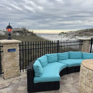 Firepit with couches just outside bar area