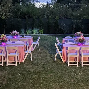 Tablescape with lighted fresh flowers centerpieces