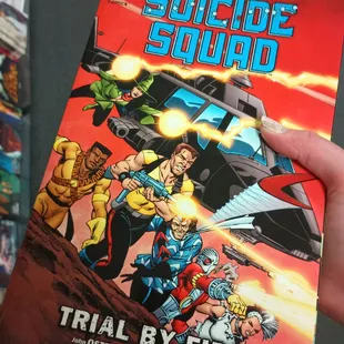 Suicide Squad TPBs, all 4 but only Trial by Fire is showing.