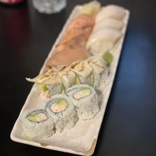 a plate of sushi on a table