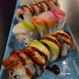Rolls: spicy salmon, white tuna, rainbow roll, Dragon Roll