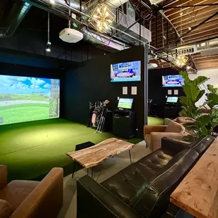 a golf simulator in a large room