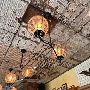 Rustic interior ceiling upon entering the restaurant. Love the industrial decor.