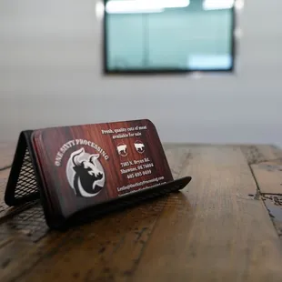 a laptop on a wooden table