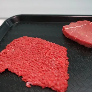 a piece of meat on a tray