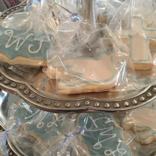 Baby boy's baptism. Doves, crosses, and his initials.