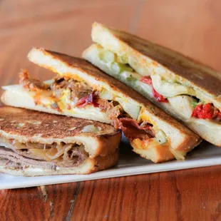 Pressed, hot and melty sandwiches all served with a mountain of pub chips