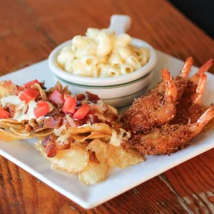 Some of our quick pub grub options! Try the Mac n Cheese Mug, Pulled Pork Chippos or Coconut Shrimp.