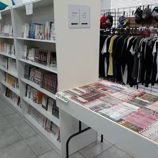 Manga on the shelves, pre-owned manga in the table. Part 2
