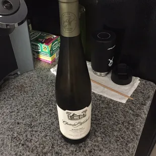 a bottle of wine on a counter