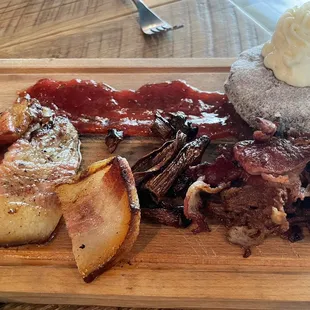 Flight of bacon appetizer with raspberry jam and goat cheese paczki. Bacon from L-R: Jowl, Trumpet mushroom and Wagyu beef.