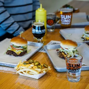 a variety of burgers and drinks