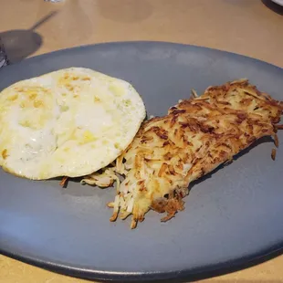 3 (small?) eggs and (less) hash browns. Kind of pathetic looking on such a large plate for the portion they give.