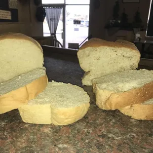 Freshly baked homemade wheat and white bread.
