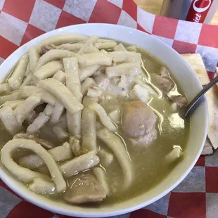 a bowl of chicken noodle soup