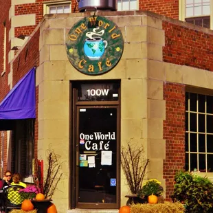 the entrance is at the tip of the flat iron style building it&apos;s in.