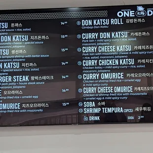 a menu on the wall of a restaurant