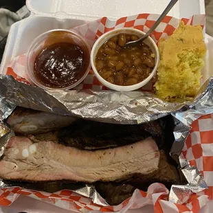 Ribs, brisket, beans, cornbread and bbq sauce